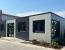 Oficina modular prefabricada exterior integrada en nave industrial en Mollet del Vallès