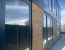 Vista exterior de oficina modular prefabricada desmontable para centro de datos en Madrid